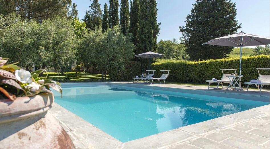 The pool with a sun umbrella